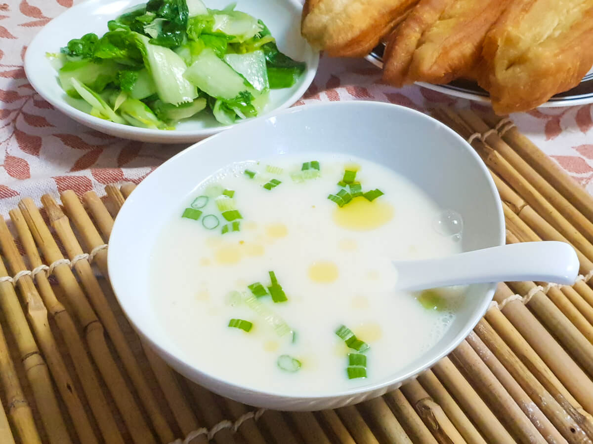 A bowl of fresh homemade soy milk